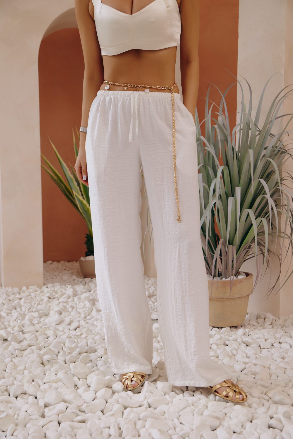 Linen pants with elastic waistband and tone-on-tone embroidery